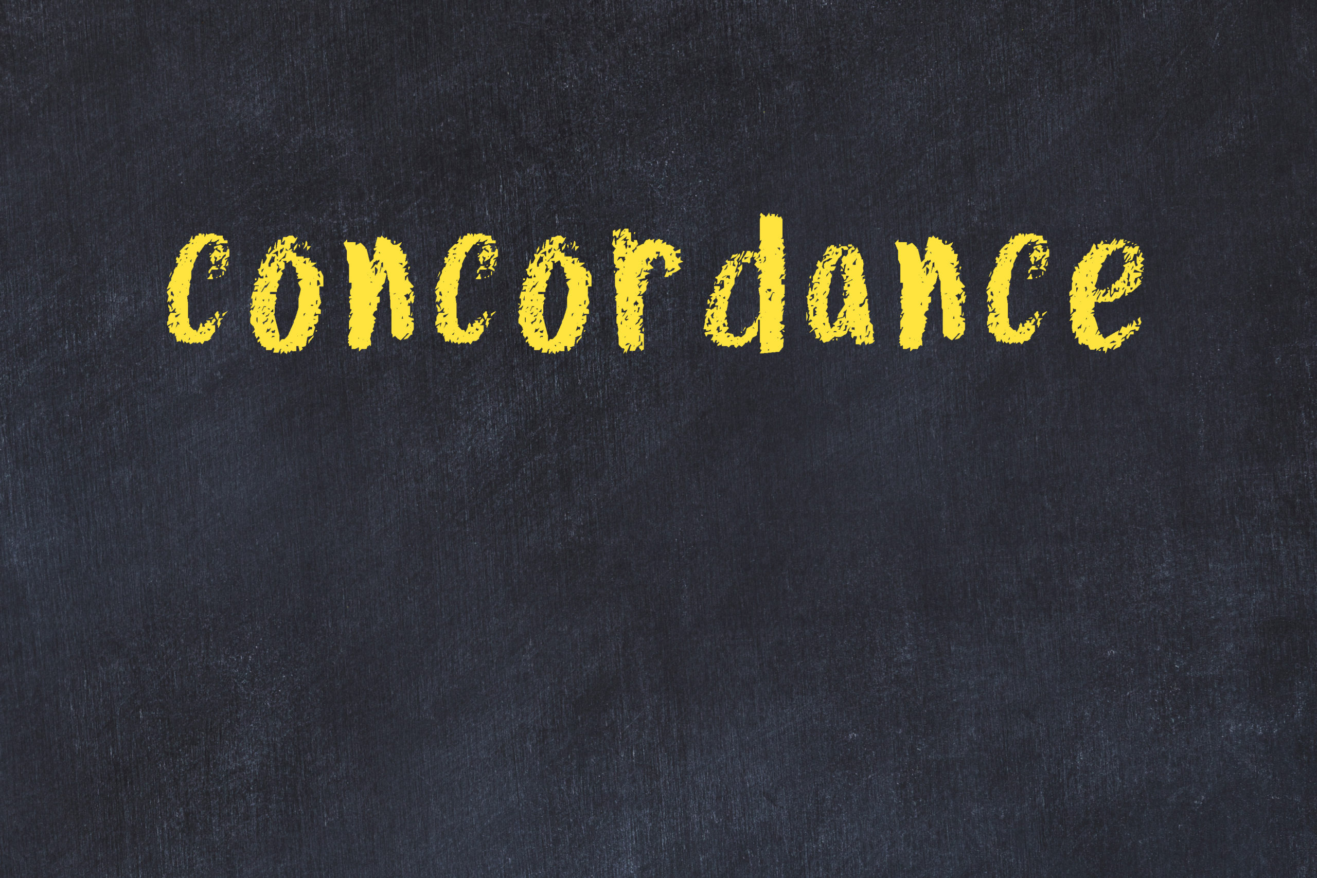 College chalk desk with the word concordance written on in